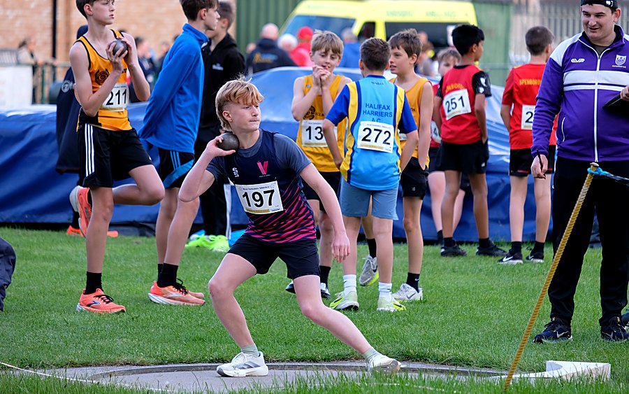 A Vale of York athlete putting the shot at a West Yorkshire Track and Field League fixture